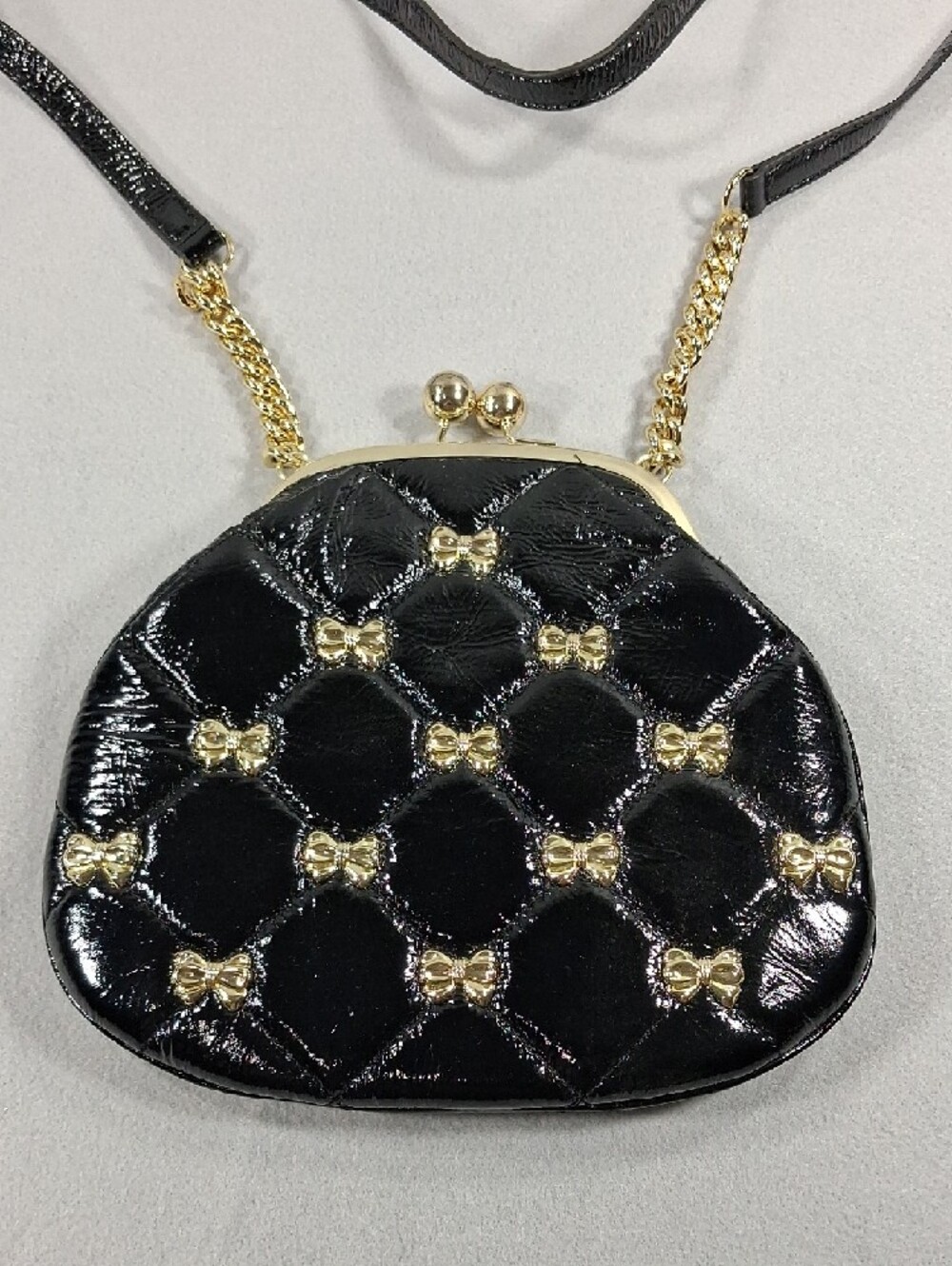 Black Quilted Crossbody Bag with Gold Accents - Picture 2 of 6